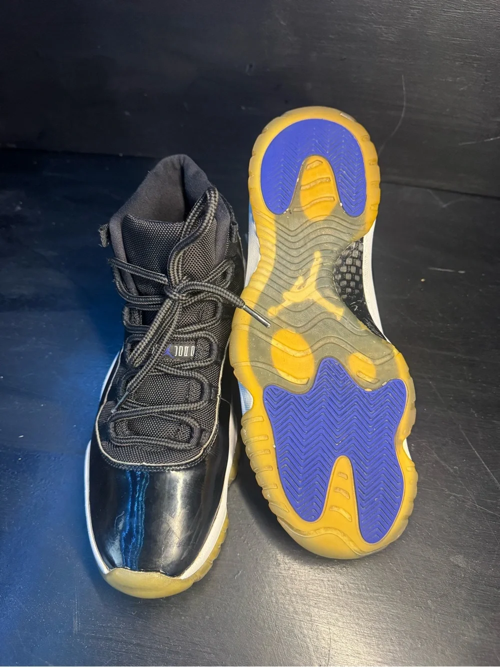 Jordan 11 Men’s Black Sneakers with Blue Jumpman